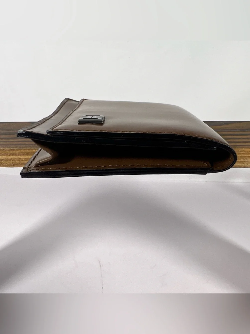 1257: Salvatore Ferragamo Gancini Leather Coin Wallet Brown